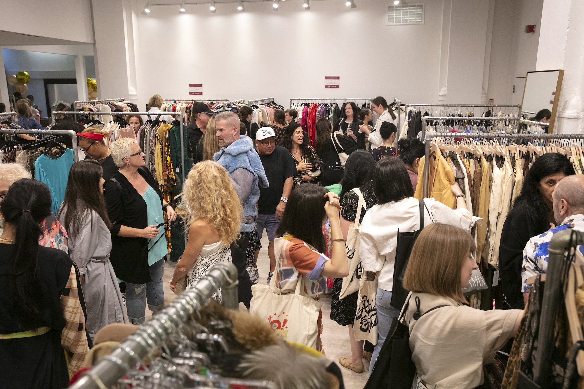 People shopping vintage clothing
