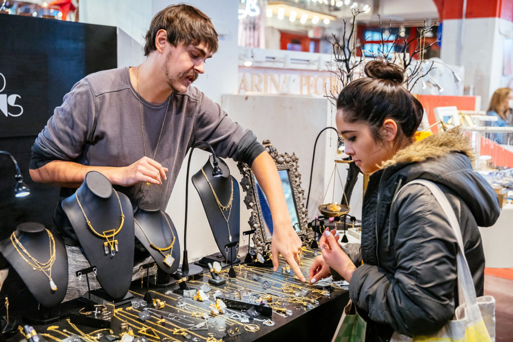 Merchant Employee helping a customer